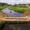 Картинка к новости Работы по восстановлению моста через реку Вохтома завершены раньше срока
